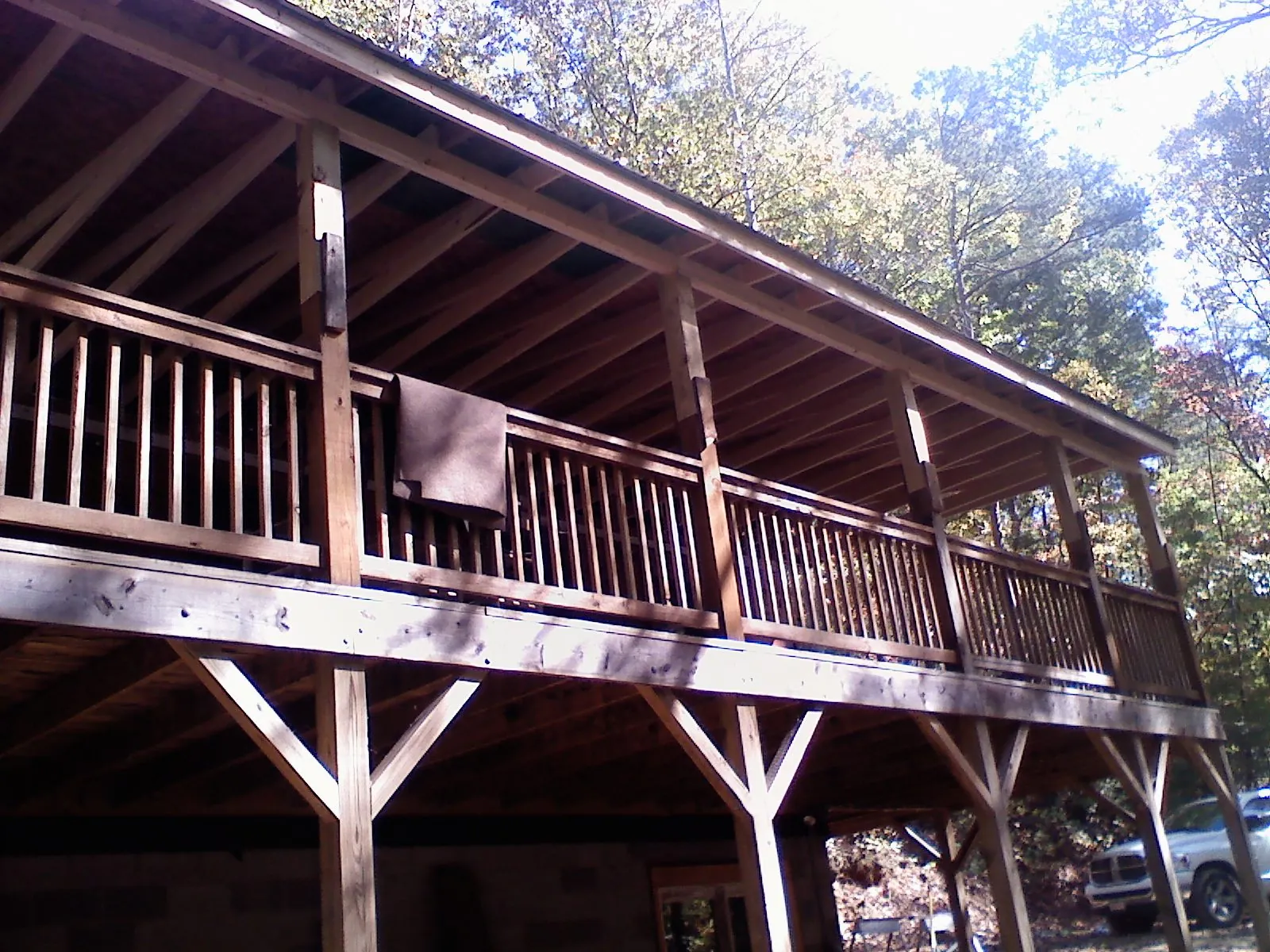 Timber framing under a new elevated porch and deck — Roof Leak Repair in Lake Orion by Roofing Brothers